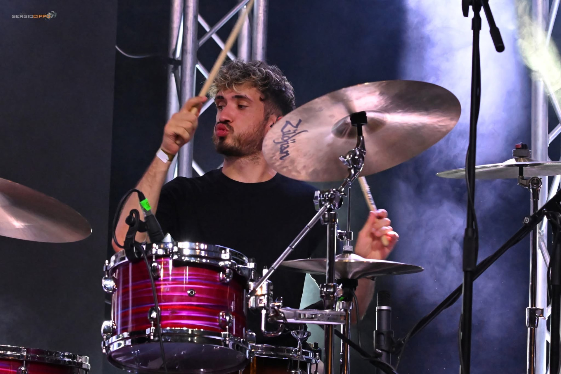 Erik playing a Zildjian cymbal live