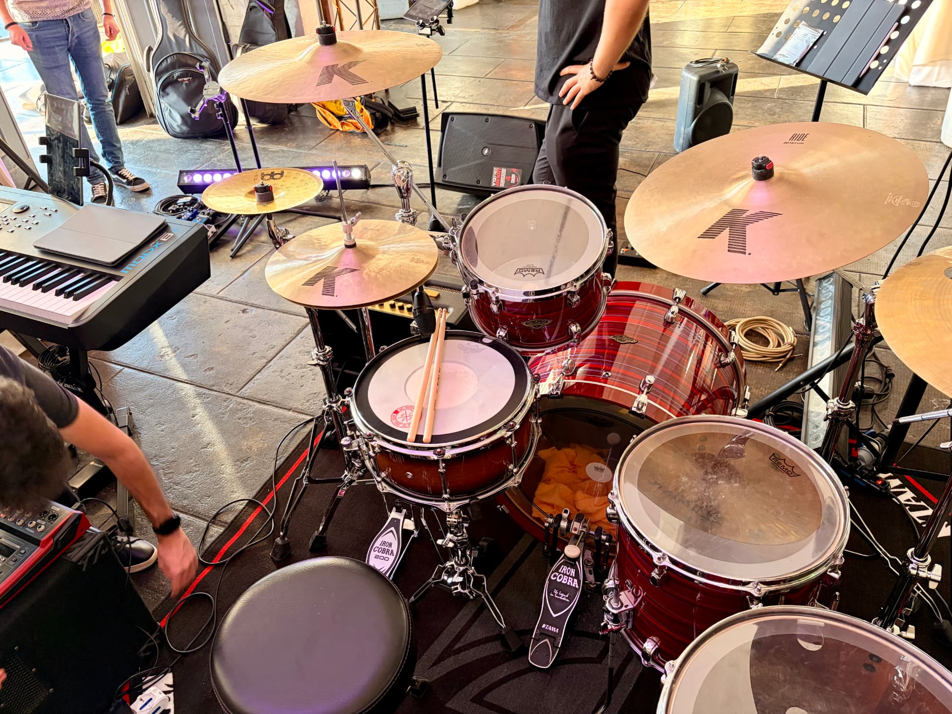 Erik's TAMA kit and Zildjian K cymbals seen from the throne