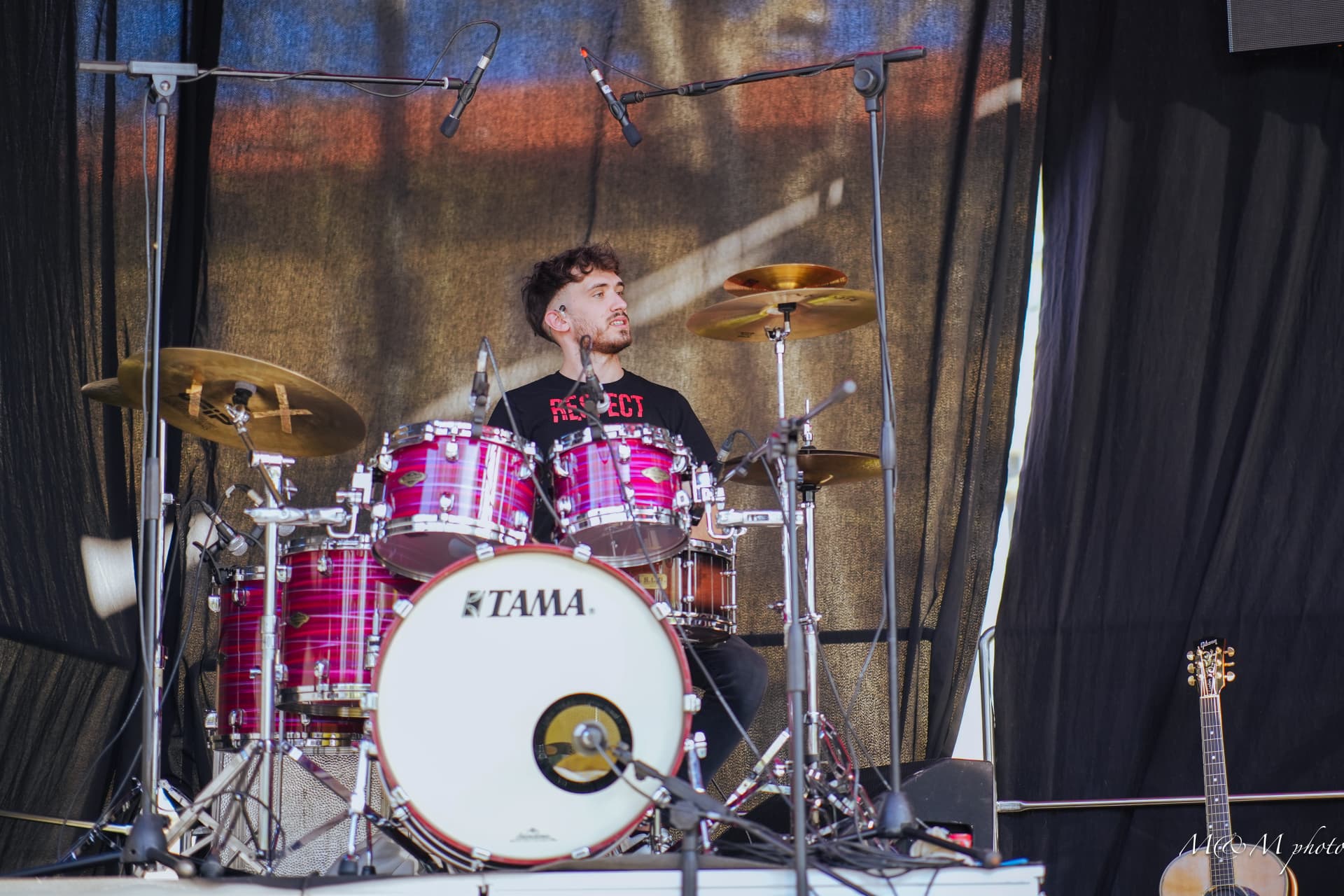 Erik performing live behind his TAMA kit